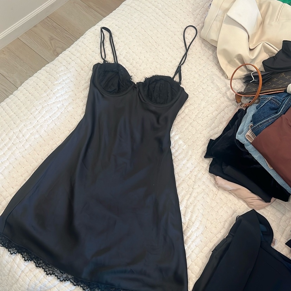 Mistress rocks House of cb like new mini dress